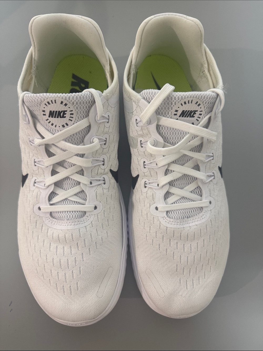 Nike RN Float White Running Shoes with Black Swoosh